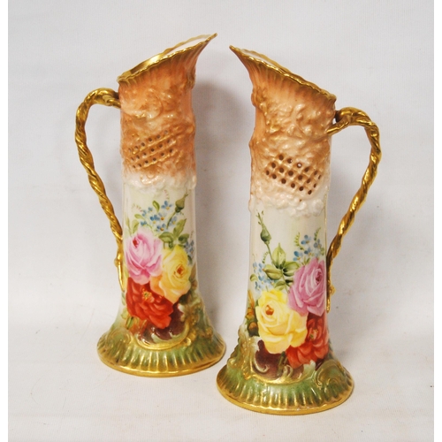 240 - Pair of Nautilus Porcelain jugs (Possil Pottery, Glasgow) decorated with pierced panels and roses on... 