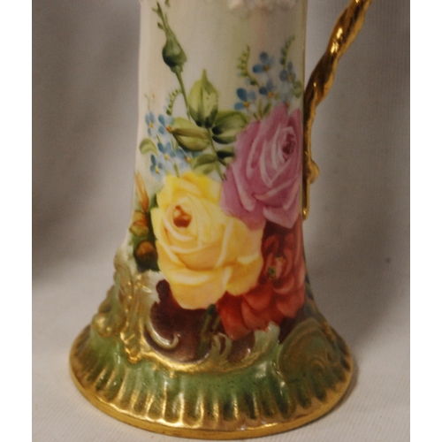 240 - Pair of Nautilus Porcelain jugs (Possil Pottery, Glasgow) decorated with pierced panels and roses on... 