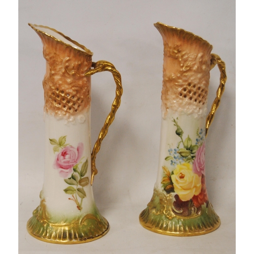 240 - Pair of Nautilus Porcelain jugs (Possil Pottery, Glasgow) decorated with pierced panels and roses on... 