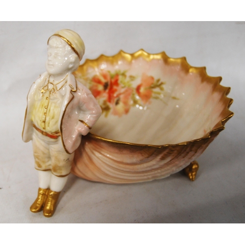 241 - Nautilus Porcelain bowl (Possil Pottery, Glasgow) with surmount of a boy, frilly gilt border, 15cm h... 