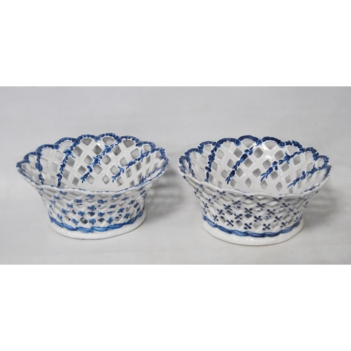 247 - Near pair of 18th century English porcelain circular dishes, c. 1770, with lattice decoration, flora... 