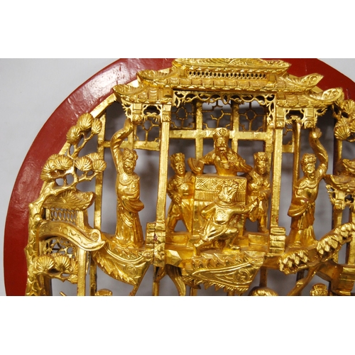 171 - Chinese giltwood wall shrine depicting figures in a palace scene above figures on horseback in a pag... 