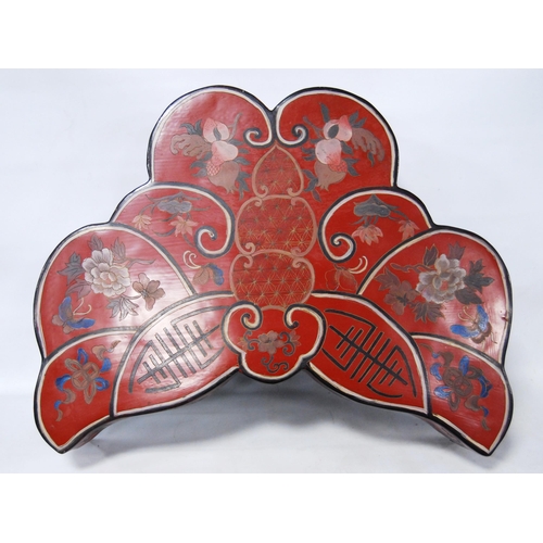 200 - Oriental red lacquered box and cover, the shaped box decorated with hand-painted panels of flowers, ... 