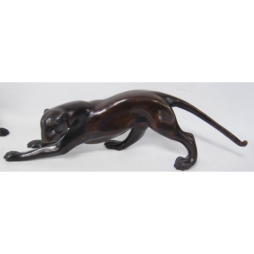 208 - Pair of patinated bronze figures of panthers in the manner of Chiparus, unsigned, 9.5cm high and 37c... 