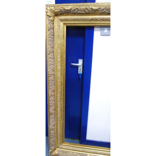 210 - 19th century ornate giltwood and gesso picture frame, aperture 121.5cm x 61.5cm, overall 157.5cm x 9... 