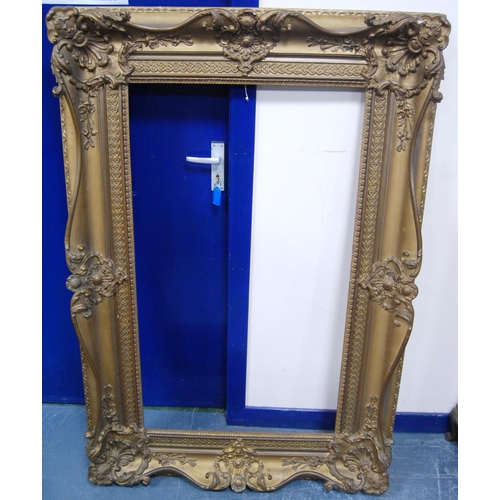 212 - 19th century giltwood and gesso French-style picture frame decorated with scroll cartouche, aperture... 