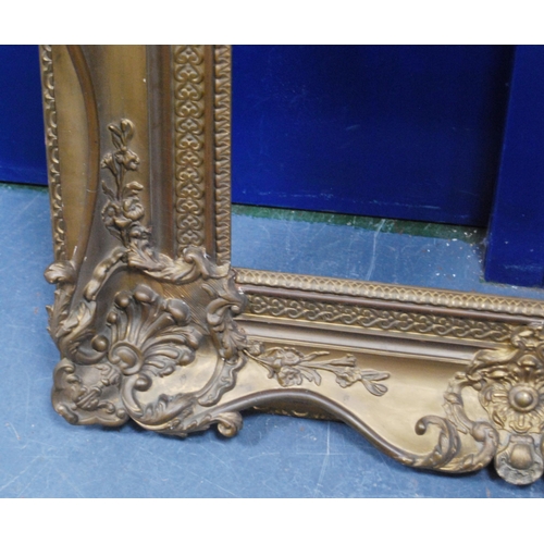 212 - 19th century giltwood and gesso French-style picture frame decorated with scroll cartouche, aperture... 