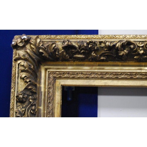 213 - 19th century ornate giltwood and gesso picture frame decorated all over with acanthus scrolls, apert... 