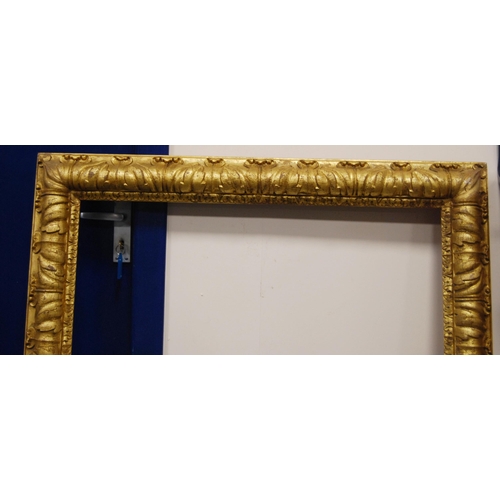 214 - 19th century giltwood and gesso picture frame, aperture 96cm x 74.5cm, overall 116cm x 96cm, and a s... 