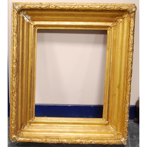 214 - 19th century giltwood and gesso picture frame, aperture 96cm x 74.5cm, overall 116cm x 96cm, and a s... 