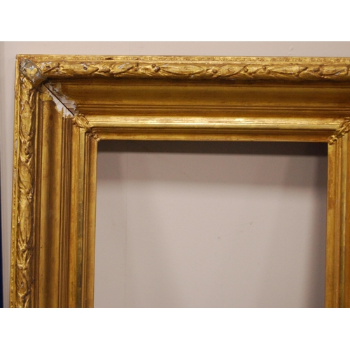 214 - 19th century giltwood and gesso picture frame, aperture 96cm x 74.5cm, overall 116cm x 96cm, and a s... 