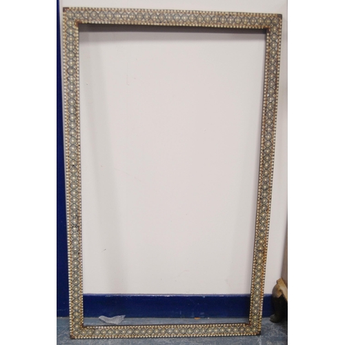 215 - Two near-matching antique Indo-Persian picture frames profusely inlaid with mother of pearl and bone... 