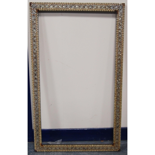 215 - Two near-matching antique Indo-Persian picture frames profusely inlaid with mother of pearl and bone... 