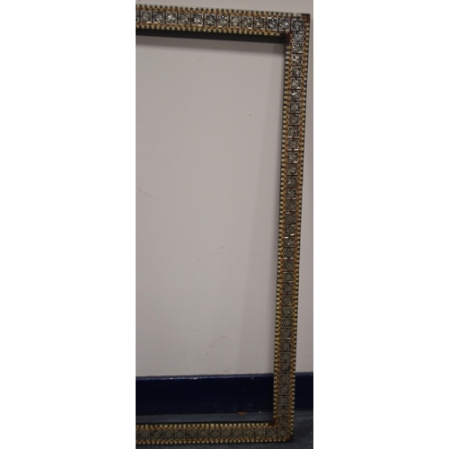 215 - Two near-matching antique Indo-Persian picture frames profusely inlaid with mother of pearl and bone... 