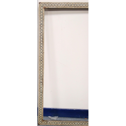 215 - Two near-matching antique Indo-Persian picture frames profusely inlaid with mother of pearl and bone... 