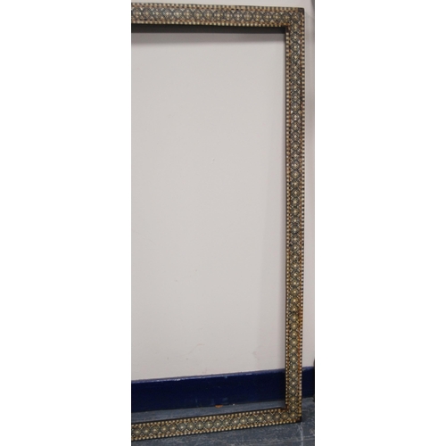 215 - Two near-matching antique Indo-Persian picture frames profusely inlaid with mother of pearl and bone... 