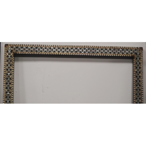 216 - Pair of antique Indo-Persian picture frames profusely inlaid with specimen woods and bone, aperture ... 