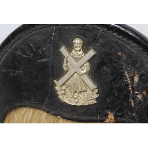 220 - Military interest: Early 20th century Scottish sporran with Royal Scots badge to the leather mount, ... 