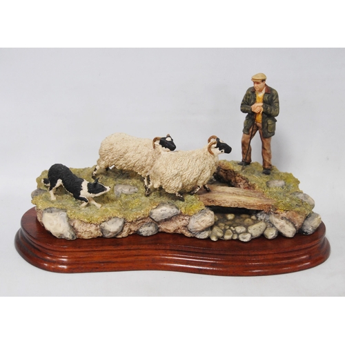 266 - Border Fine Arts limited edition group by Ray Ayres modelled as a farrier with sheepdog and sheep, o... 