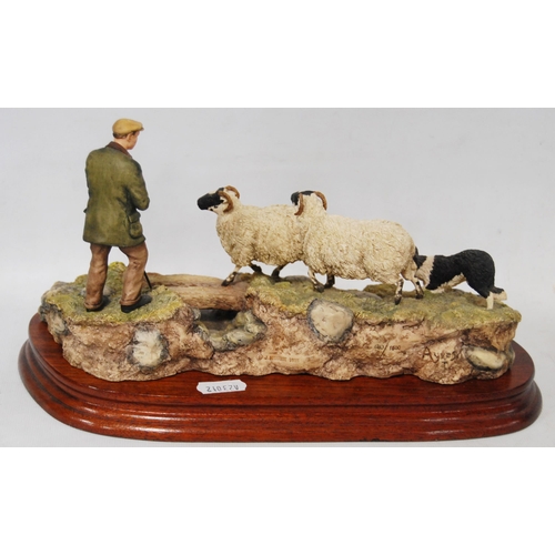 266 - Border Fine Arts limited edition group by Ray Ayres modelled as a farrier with sheepdog and sheep, o... 