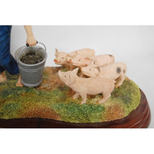 277 - Border Fine Arts group, 'Feeding Piglets', from the Young Farmers range, no. A5030, on a fixed stand... 