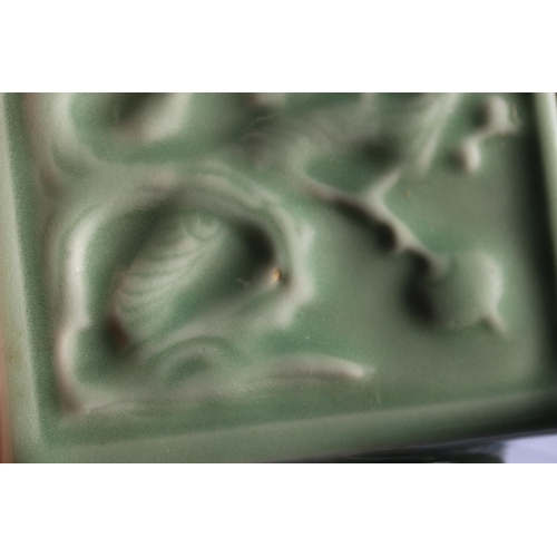 394 - Chinese celadon porcelain vase of square section, decorated with relief floral designs, reign seal m... 