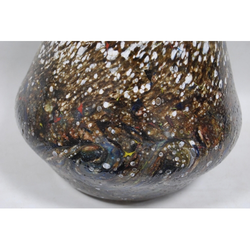 253 - Art glass vase in the style of Monart, with multi-coloured inclusions and swirl decoration, raised c... 