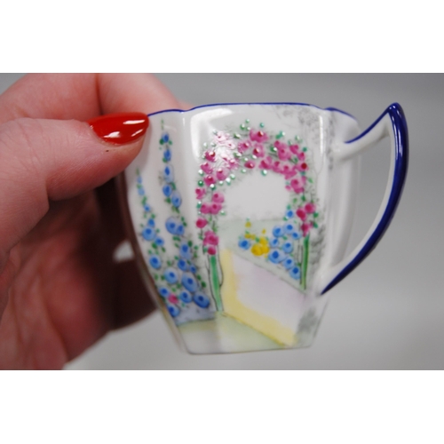 263 - Shelley Art Deco 'Archway of Roses' pattern porcelain coffee service, c. 1928, comprising a coffee p... 