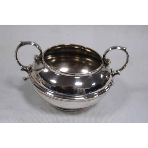 157 - Silver three-piece composite tea service, hallmarks for Mappin & Webb, Chester, date letter E, c... 