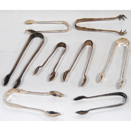 158 - Eight pairs of Georgian and later silver sugar tongs, various sizes.  (8)