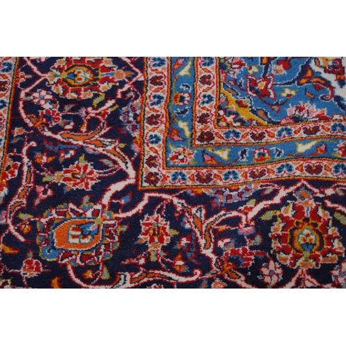 364 - Persian Tabriz carpet with a large medallion to the centre, all over foliate swags to the border, on... 