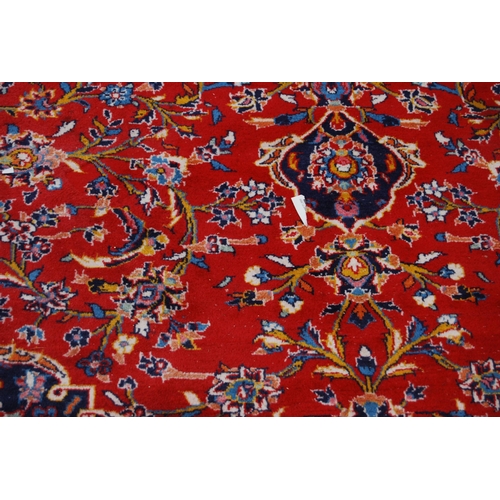 364 - Persian Tabriz carpet with a large medallion to the centre, all over foliate swags to the border, on... 