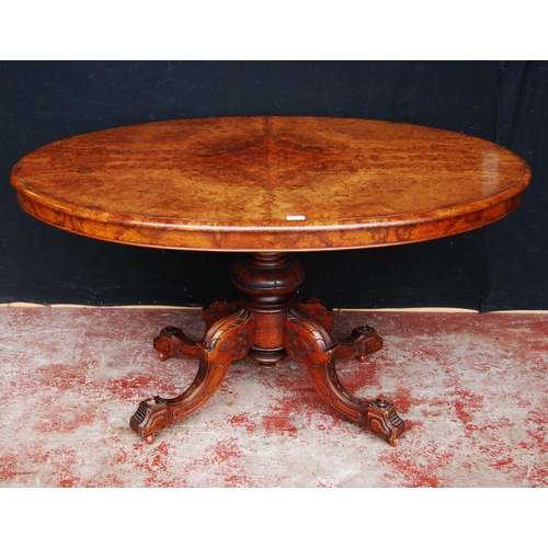 416 - Victorian burr walnut loo-type table, the oval top with snap action mechanism, on turned column and ... 