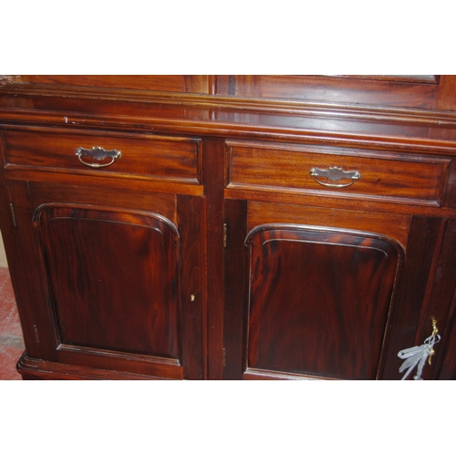 419 - Victorian-style mahogany four-door library bookcase, the dentil decorated cornice above four glazed ... 