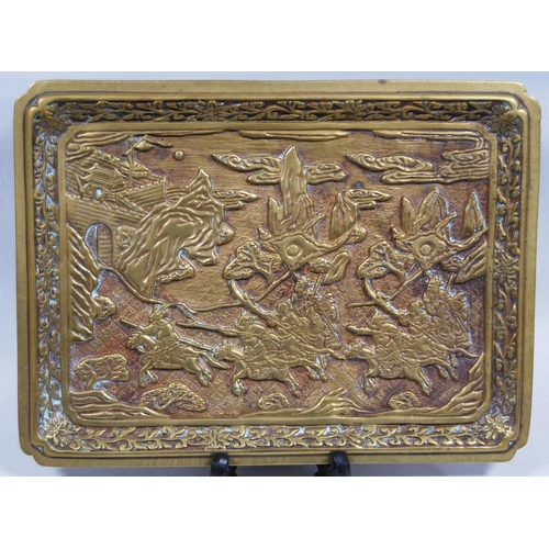 174 - Oriental brass tray (early part of the 20th century), probably Japanese, decorated with relief figur... 