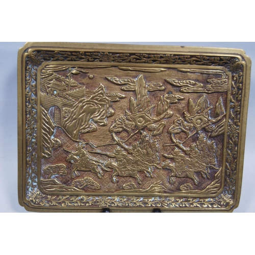 174 - Oriental brass tray (early part of the 20th century), probably Japanese, decorated with relief figur... 