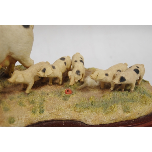 269 - Border Fine Arts group by Kirsty Armstrong modelled as a pig and piglets at baskets of apples, on a ... 