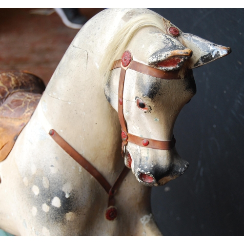 224 - Vintage painted wood dapple grey rocking horse fixed to a painted cradle, with loose stirrups, 91cm ... 