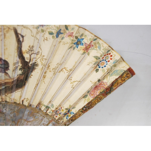 225 - 18th century French fan decorated with mythical gods and figures within foliage, gilt border to the ... 