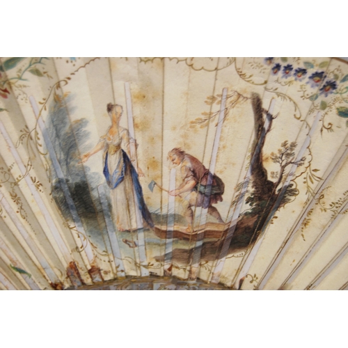 225 - 18th century French fan decorated with mythical gods and figures within foliage, gilt border to the ... 