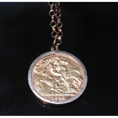 137 - George V gold half sovereign pendant, 1911, mounted on a 9ct gold chain, 6.6g gross.