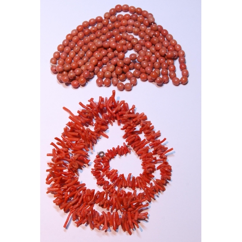 160 - Coral branch necklace of long form, 72.5cm long, and a string of coral-style beads with yellow metal... 