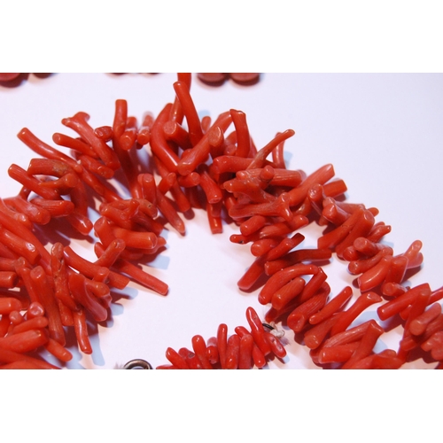 160 - Coral branch necklace of long form, 72.5cm long, and a string of coral-style beads with yellow metal... 