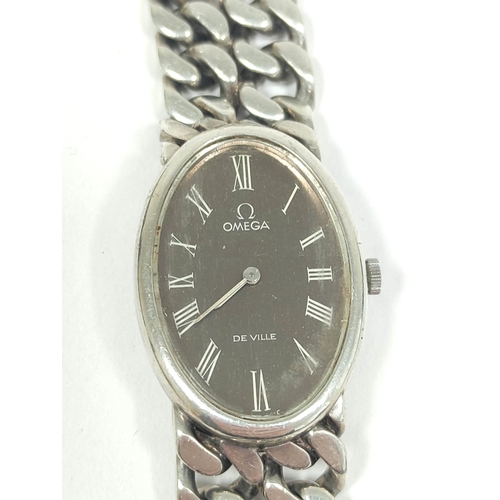 18 - Omega de Ville silver watch with oval bronze dial on silver filed curb bracelet.