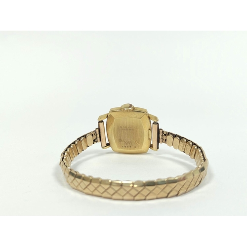 19 - Rodania lady's 18ct gold watch of rounded rectangular shape No 1687 on 9ct gold Excalibur bracelet.