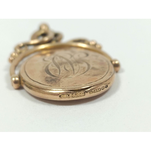42 - 9ct gold swivel locket, initialled 1920. 6g