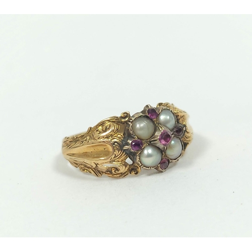 49 - Early Victorian garnet and pearl ring in engraved gold, probably 15ct, size 'N'.