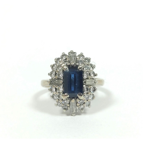 53 - Diamond and sapphire oval cluster ring with four tapering baguettes, two rows of brilliants and rect... 