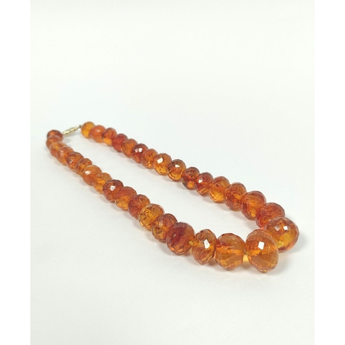 59 - Amber faceted bead necklace. 39g