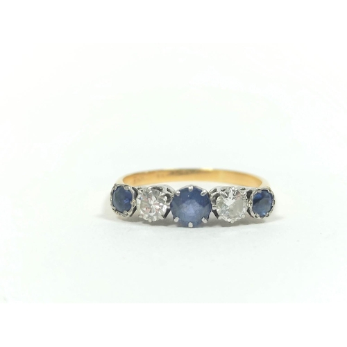 71 - Diamond and sapphire five stone ring, two brilliants approximately .3ct in gold and platinum. Size '... 